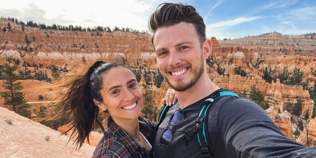 Abe and Krista Stewart hiking in southern Utah canyons – Hunghee Energy founders promoting healthy, active, outdoor living and natural fuel