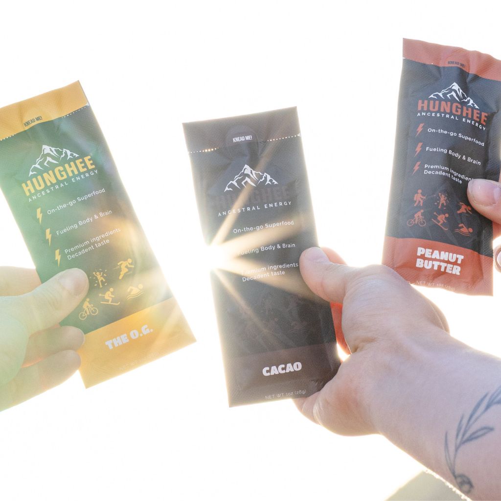 Hunghee Energy Ancestral snacks outdoors in sunlight - high-fat fuel for adventure, endurance, and clean energy