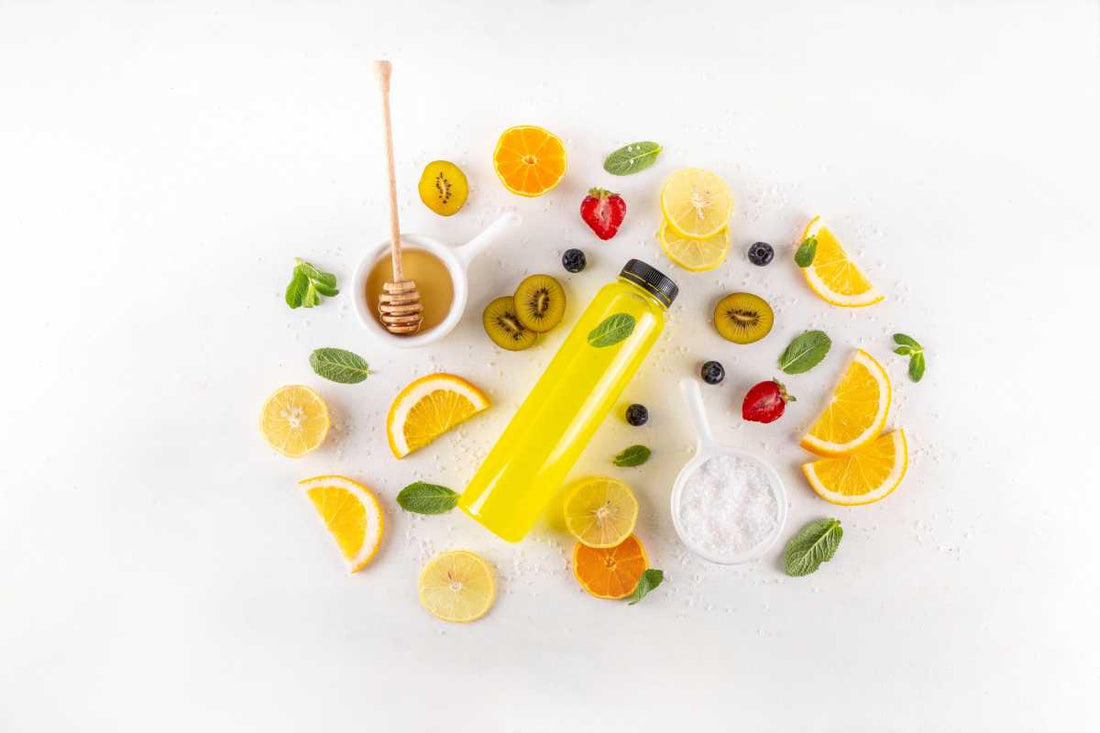 Citrus drink bottle with honey, mint, and sea salt for electrolytes.