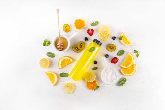 Citrus drink bottle with honey, mint, and sea salt for electrolytes.